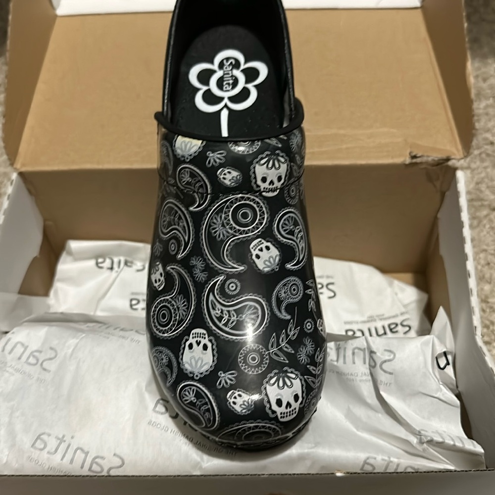 Brand new in box Sanita size 38 black with skulls clogs